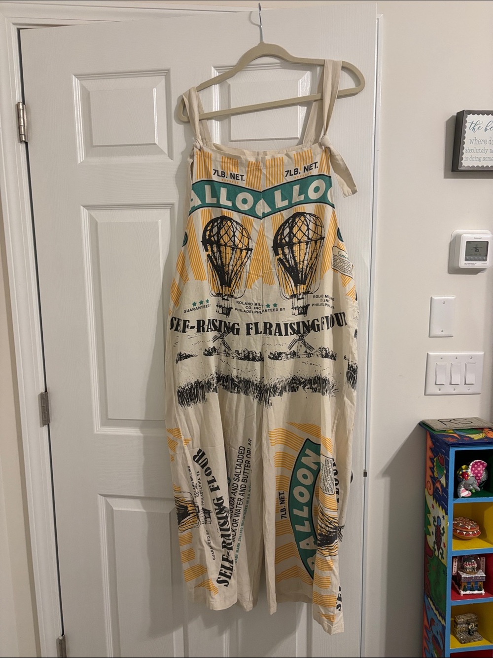 Cream Market Overalls with Yellow, Teal and Black Hot Air Balloon Print
